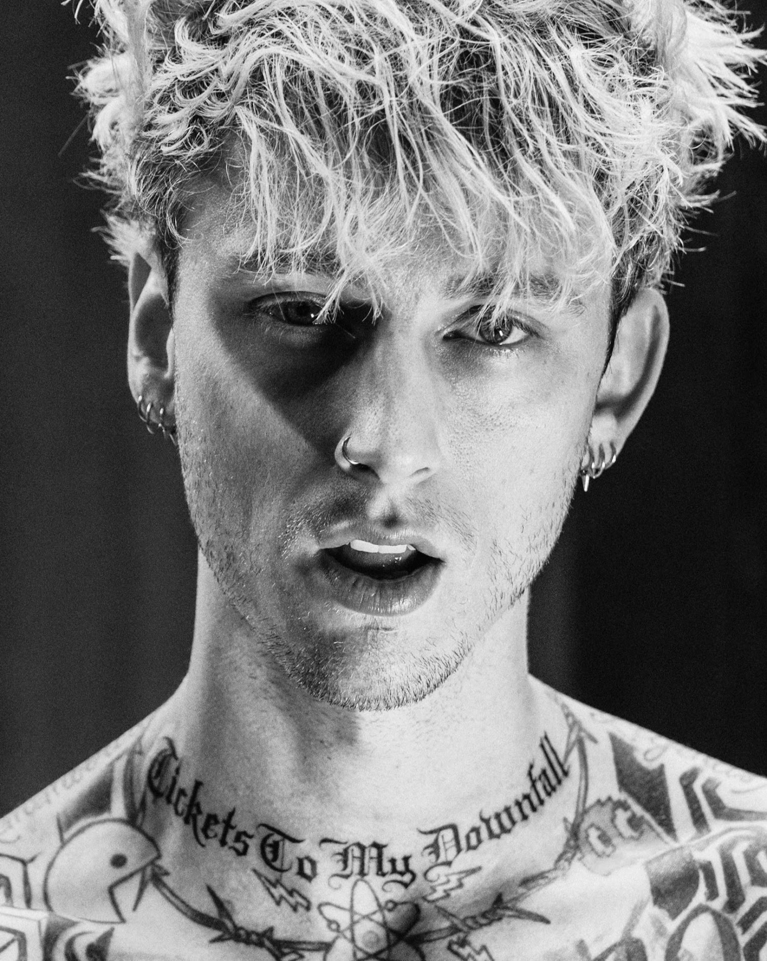 Machine Gun Kelly and Travis Barker Share Socially Distant image