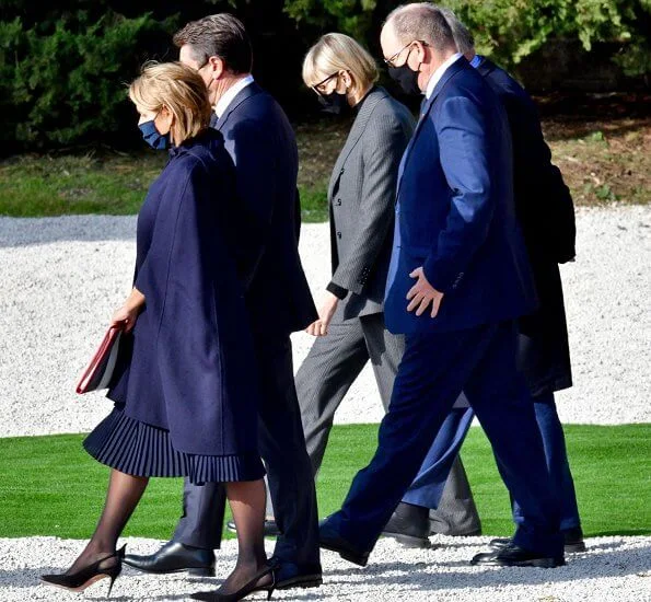 Princess Charlene of Monaco wore a double-breasted grey pinstripe jacket/blazer suit from MaxMara, Ralph Lauren, Akris and Brunello Cucinelli