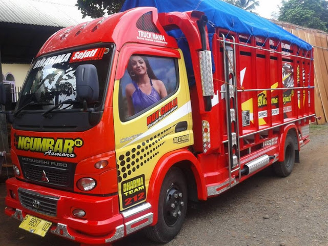 Modifikasi Truk Canter Sakera-kuning merah