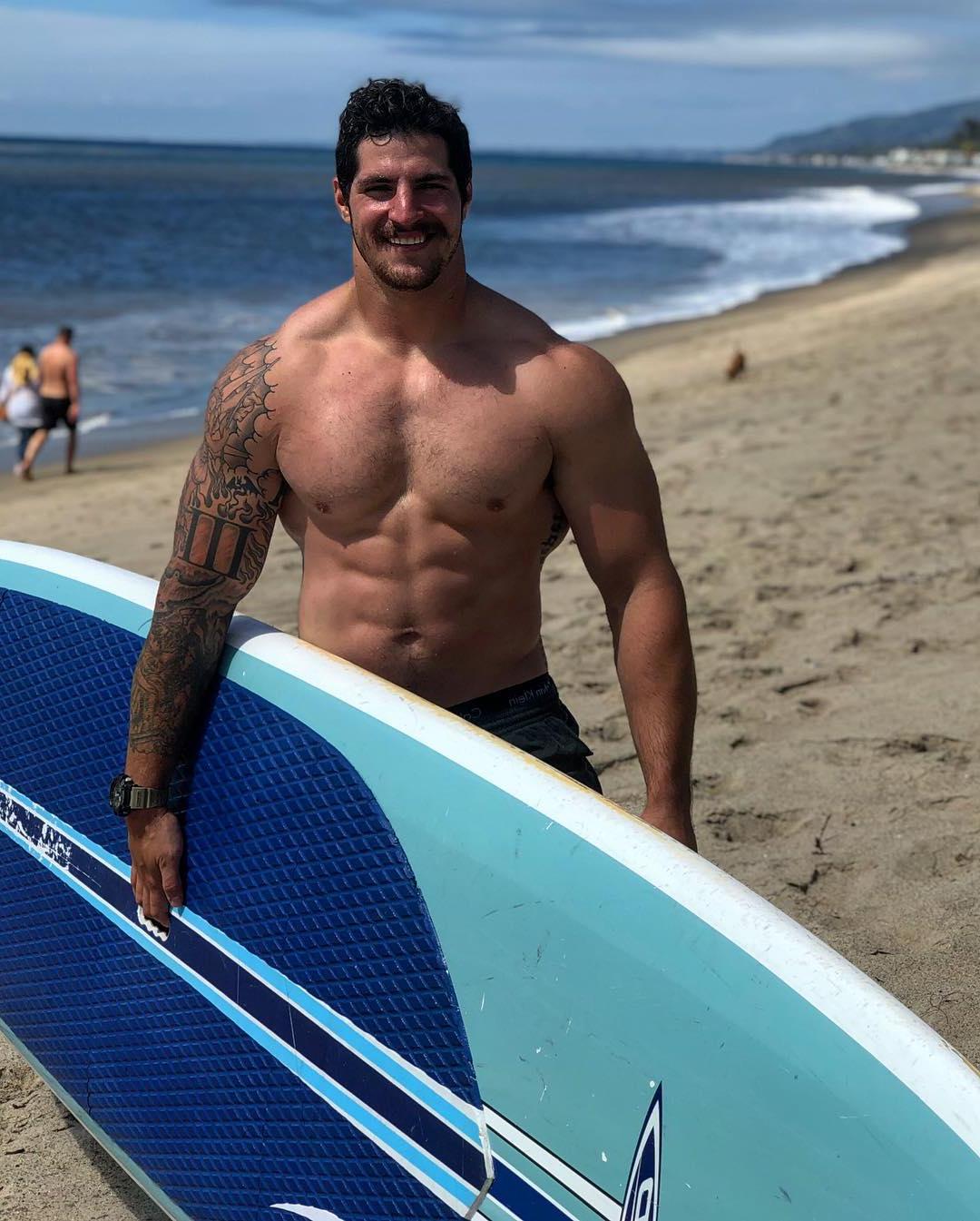 sexy-mustache-man-shirtless-fit-muscular-body-beach-surfer