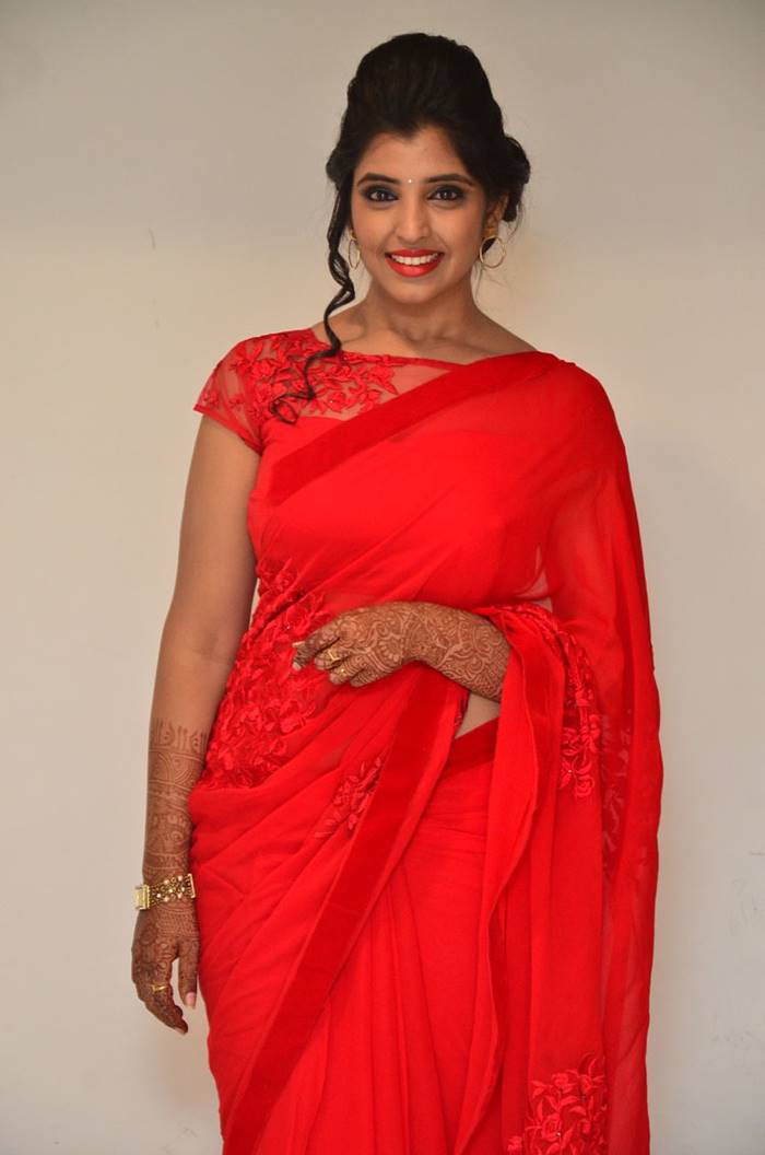 Telugu Anchor Syamala Stills In Red Saree at Film Audio Launch
