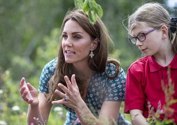 Kate Middleton wore a short sleeved printed dress by Sandro, Castaner Carina wedge, Accessorize polly petal drop earrings