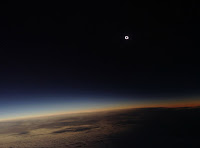 Total Solar Eclipse seen from plane above Atlantic Ocean