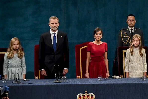 Queen Letizia, Queen Sofia, Crown Princess Leonor and Infanta Sofia. Queen Letizia wore a red satin dress and earrings