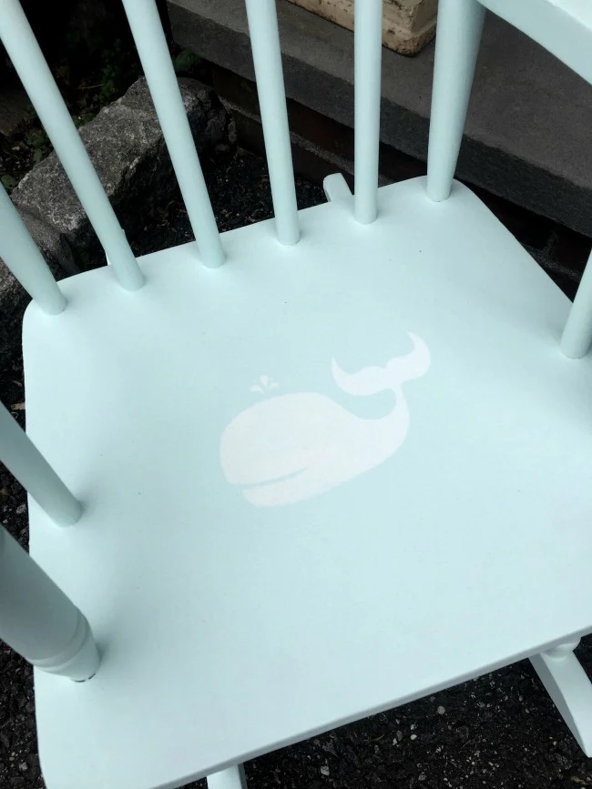 stenciled whale on rocking chair