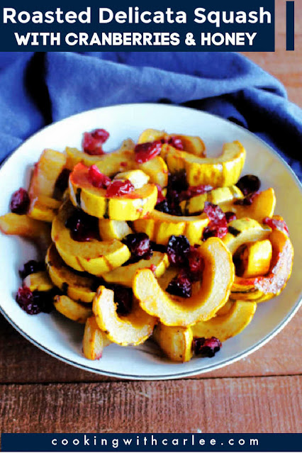 This roasted delicata squash is the perfect fall side dish. It is just a little sweet from the honey and a little tart from fresh or frozen cranberries. Plus there is a hint of citrus to bring it all together. It brings bright gem tones to you dinner plate and loads of flavor too! This roasted delicata squash is the perfect fall side dish. It is just a little sweet from the honey and a little tart from fresh or frozen cranberries. Plus there is a hint of citrus to bring it all together. It brings bright gem tones to you dinner plate and loads of flavor too!