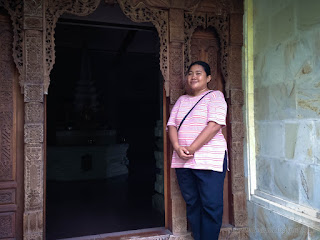 Woman Traveler In Front Of The Door Of Dark Buddhist Meditation Room At Buddhist Monastery North Bali Indonesia