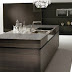 Luxurious Kitchen Of Dark Wood And Emperor Marble