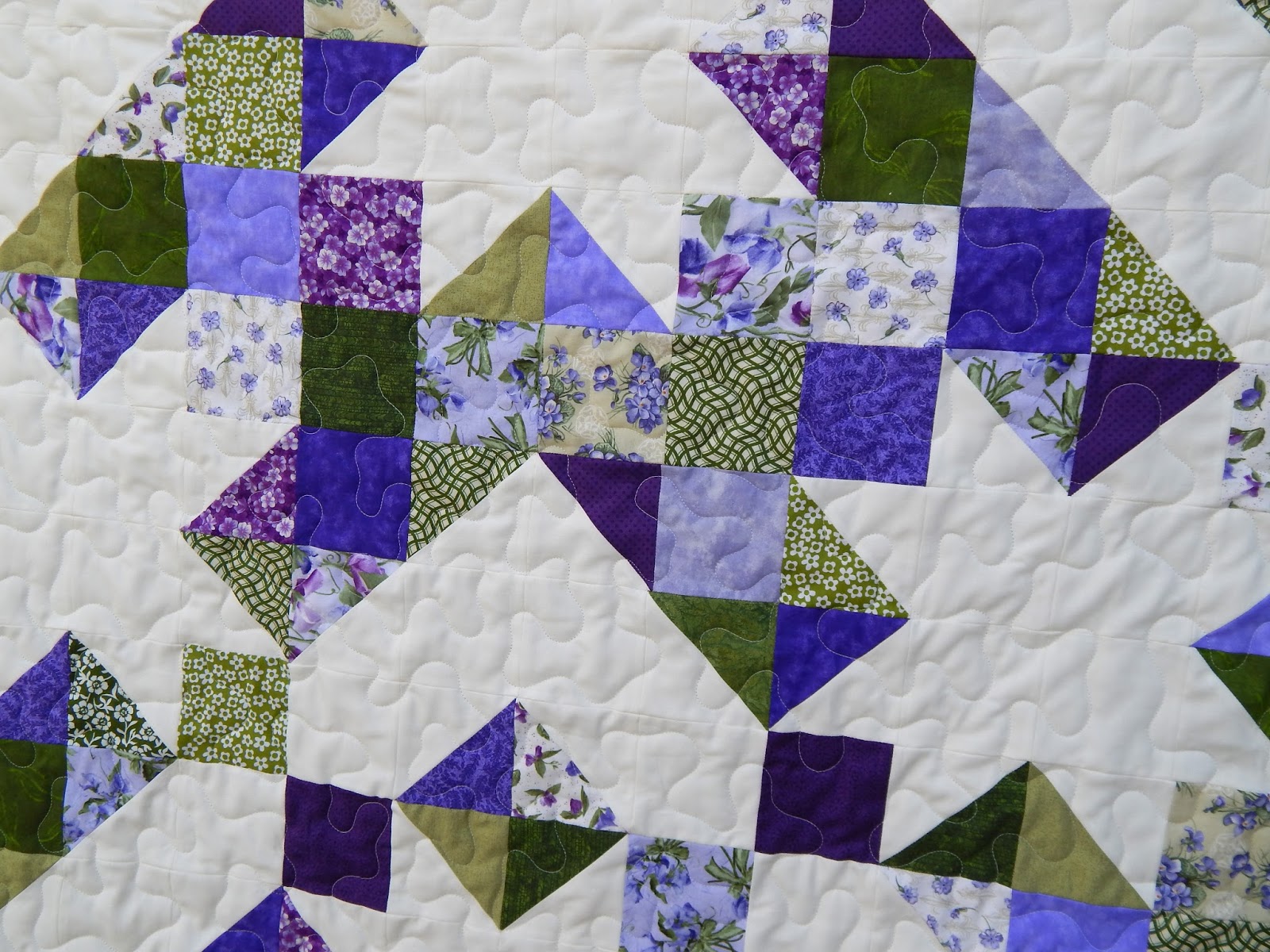 The Fleming's Nine Sunbeam Quilt in Purple and Green