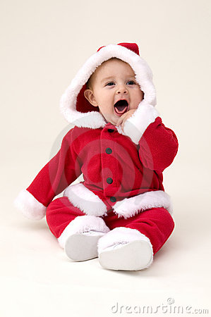 baby girl dressed up in santa costume