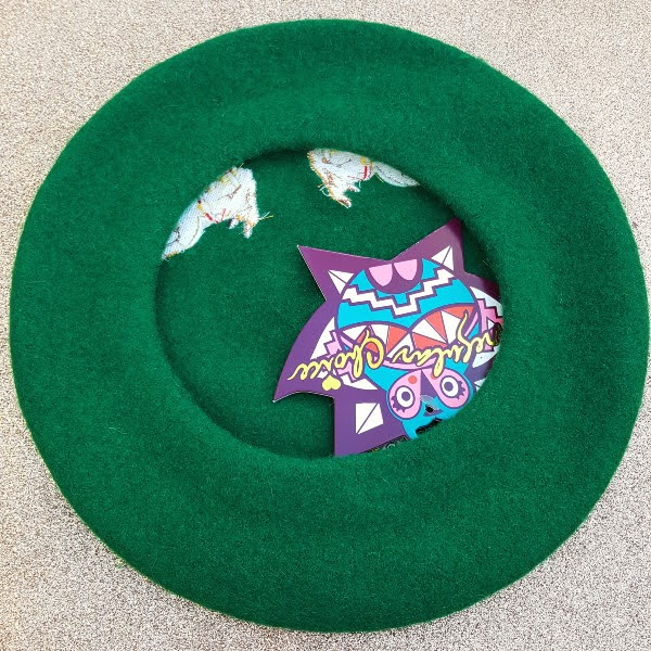 back of green wool Christmas beret