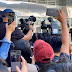 Huge crowd gathered outside of V-MALL is dangerously livestreaming the police operation on Facebook as it unfolds