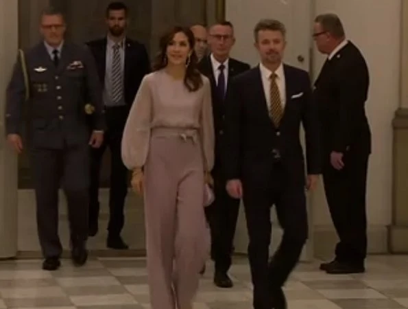 Crown Princess Mary wore Max Mara Leonida jumpsuit, Gianvito Rossi classic blush suede pumps, and carried Bottega Veneta knot clutch