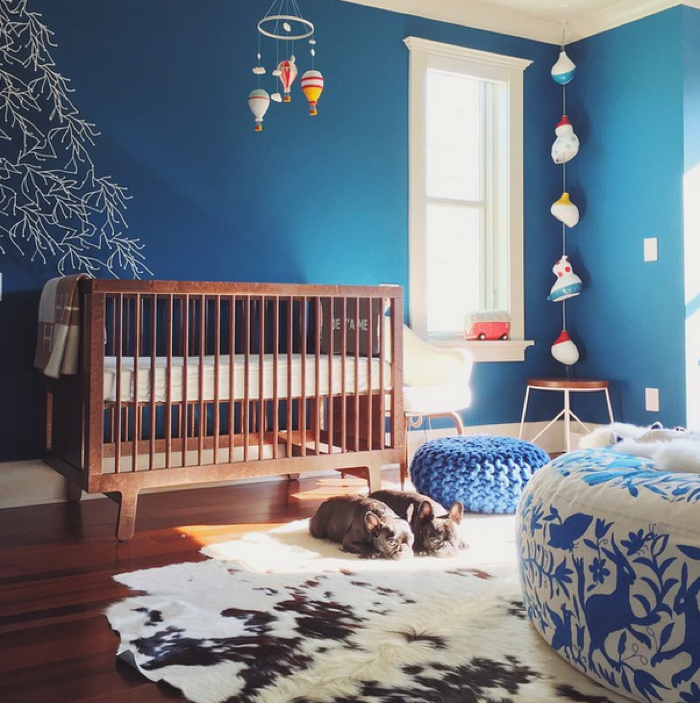 nursery in blue colour with crib from oeuf NY