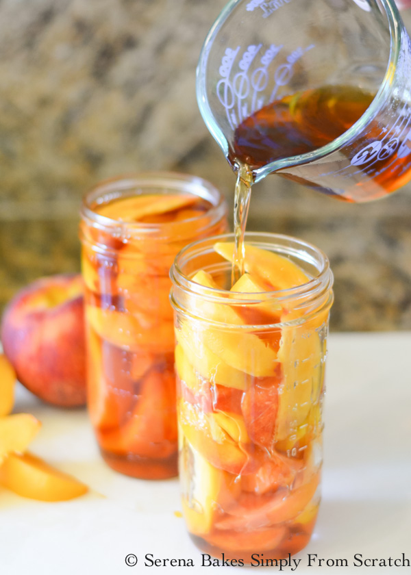 Cover peaches with whisky mixture to make whisky soaked peaches.