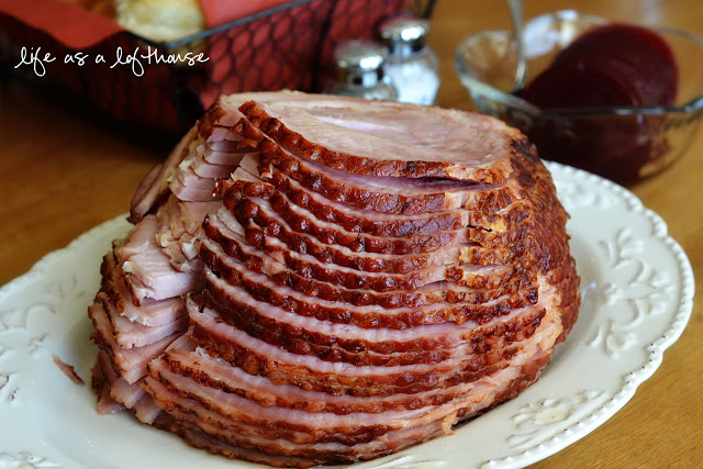 Crock Pot Maple Brown Sugar Ham is ham covered in brown sugar, maple syrup and pineapple juice slow cooked in the Crock Pot. Life-in-the-Lofthouse.com