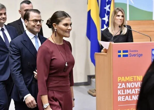 Crown Princess Victoria wore Andiata Kamille trousers and Kiana blouse. Vogt bag and Stinaa J boots. Oscar de la Renta earrings