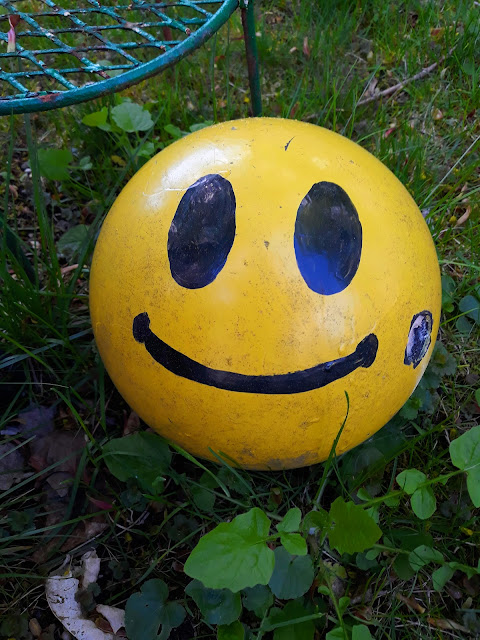 Writing Straight from the Heart: A Bowling Ball Happy Face for the Yard