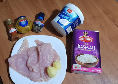 Immagine con Ingredienti per il pollo al curry con riso basmati e patate 