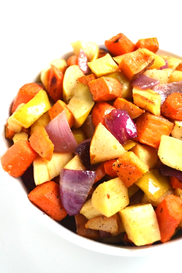 Roasted Root Vegetables with Spicy Balsamic Drizzle is flavorful and a simple side dish loaded with your favorite fall produce including sweet potatoes, parsnips, carrots, onions, pears and apples! www.nutritionistreviews.com