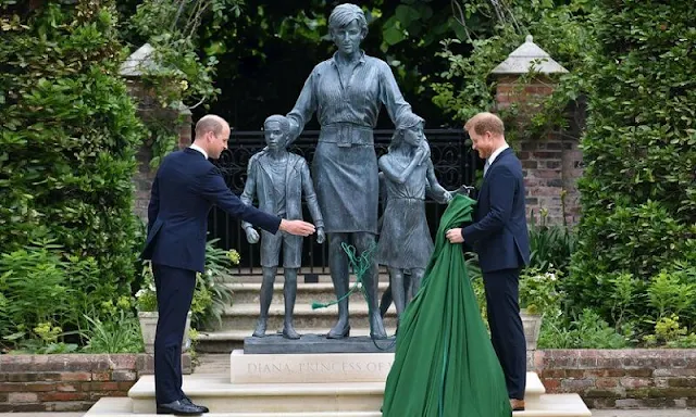 Prince William and Prince Harry at a ceremony at Kensington Palace