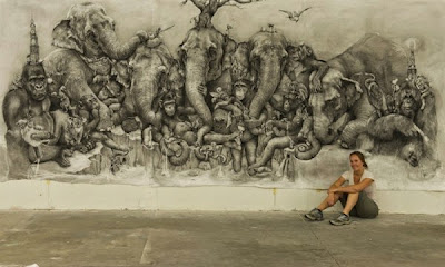 Mural de animales con lápiz al carbón