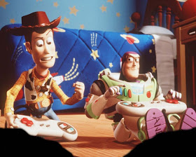 Buzz and Woody playing video game Toy Story 1995 animatedfilmreviews.filminspector.com
