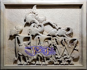 Ukiran relief wayang pendawa lima dari batu alam jogja