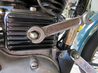 Royal Enfield wrench fits on this nut.