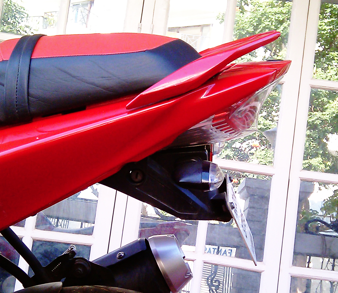 motorcycle with exhaust under seat