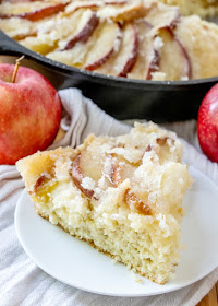 This dutch apple cake recipe has been in my family for generations. It is a simple cake topped with apples and plenty of golden topping. It is great as a coffee cake at breakfast, for an afternoon treat or as a simple dessert. You can take it straight from my great-great grandma's recipe box and put it into yours! slice of dutch apple coffee cake, ready to eat