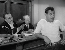 Sordi (right) in a scene from his 1954 film An American in  Rome, which established him as a comic character actor