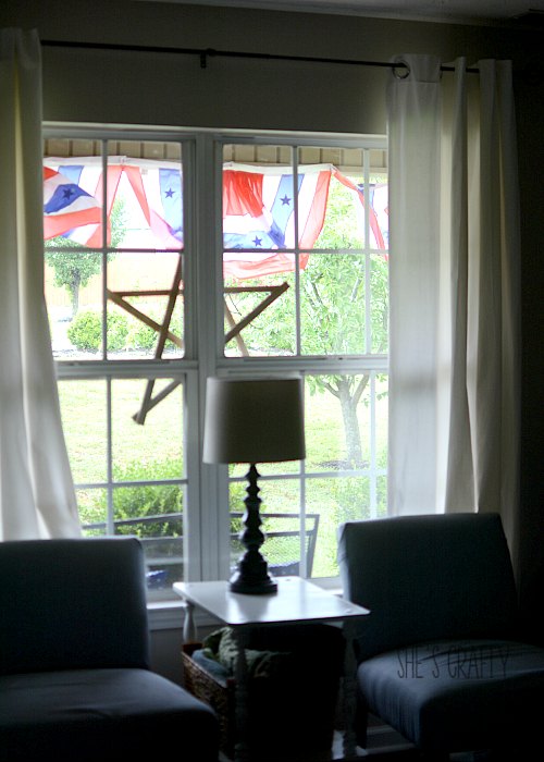 patriotic home decorations- wooden star and flags on front porch