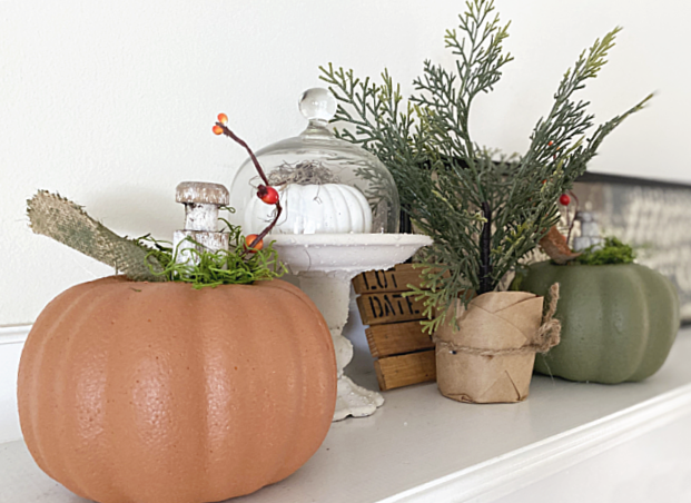 pumpkins on the mantel