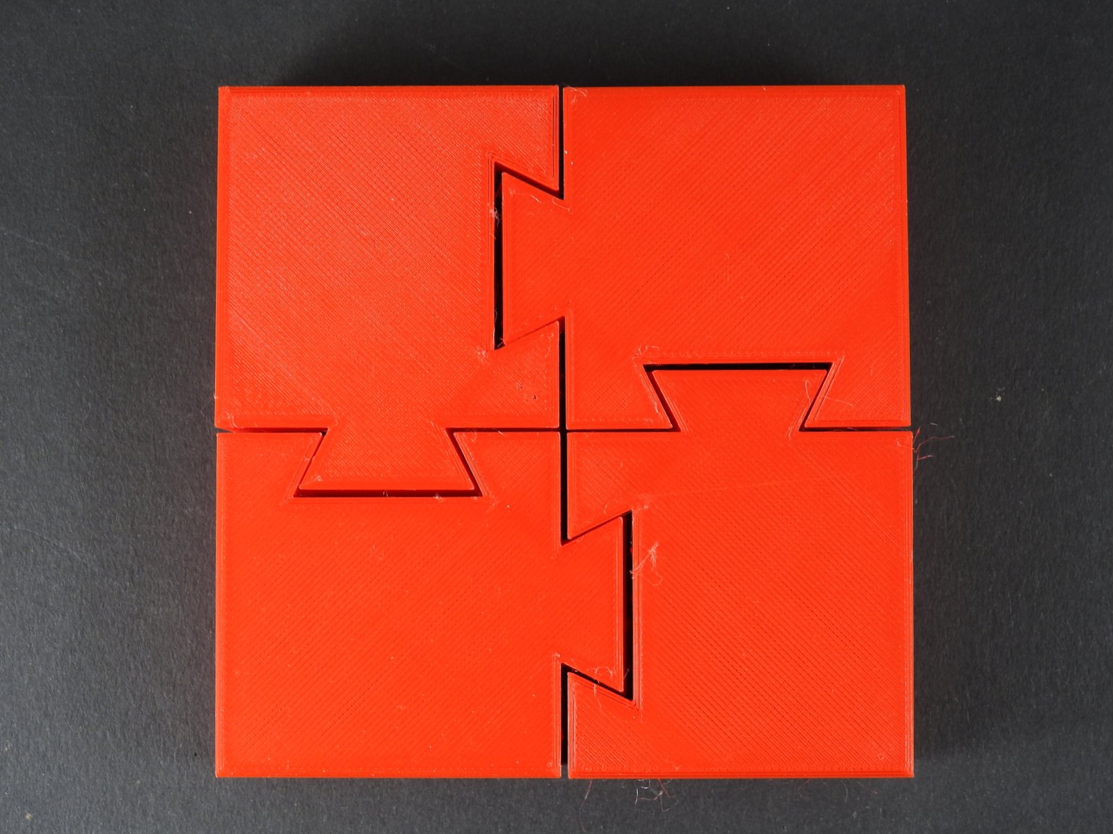 Welt der Geduldspiele Klassisches 2x2Puzzles mit schrägen Schnitten