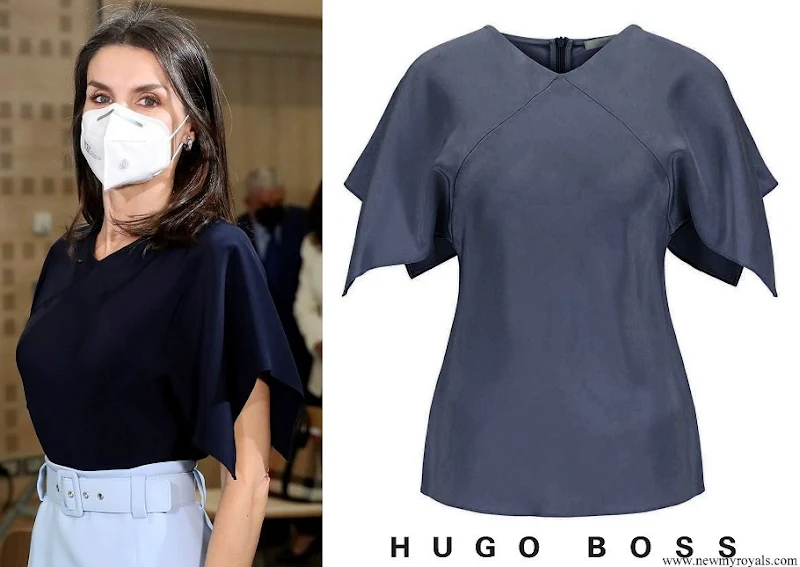 Queen Letizia wore Hugo Boss Ibiaska navy blue v-neck top in pure silk with flared sleeves