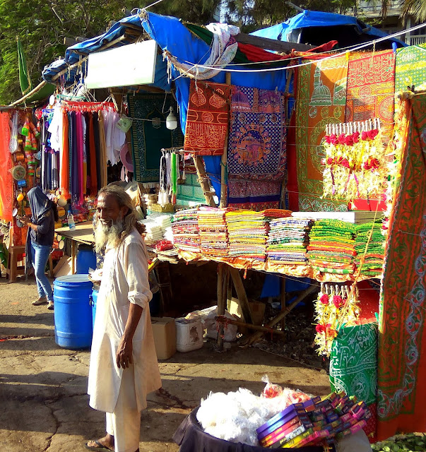 street, street photo, street photography, haji ali, path, shop, offerings, shopkeeper, happy, mumbai, incredible india, worli