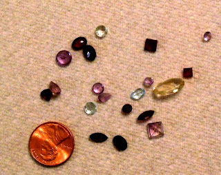 These are the gems I found.  Several of them, including the yellow oval, I watched as they appeared on the carpet before me.
