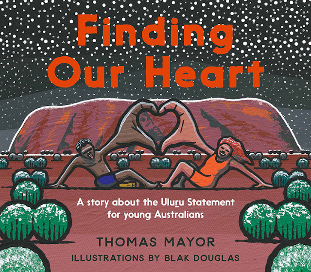 The cover of the book "Finding Our Heart" which has an illustration of a man and woman making a heart shape with their hands. Behind them is Uluru and a starry night sky. 