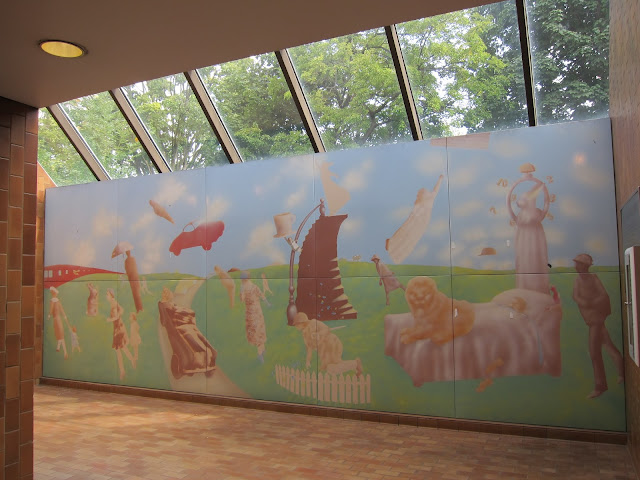 The 25 foot fantasy mural required more than four months to paint and fire. The skylight is a welcome bonus.