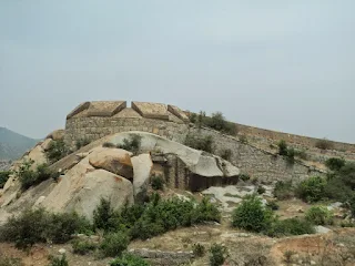 The group posing with their bikes on the highway after breakfast