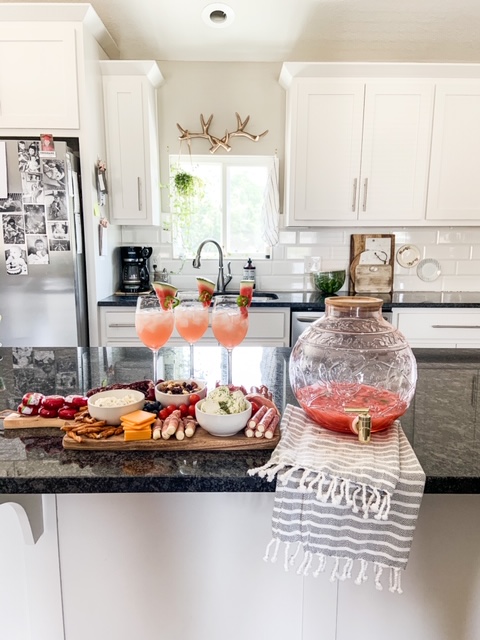 charcuterie board and margaritas for guests