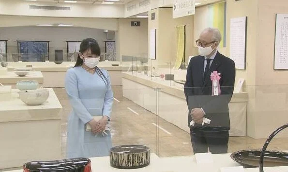 Princess Mako of Japan wore a pearl necklace and a blue v-neck midi dress