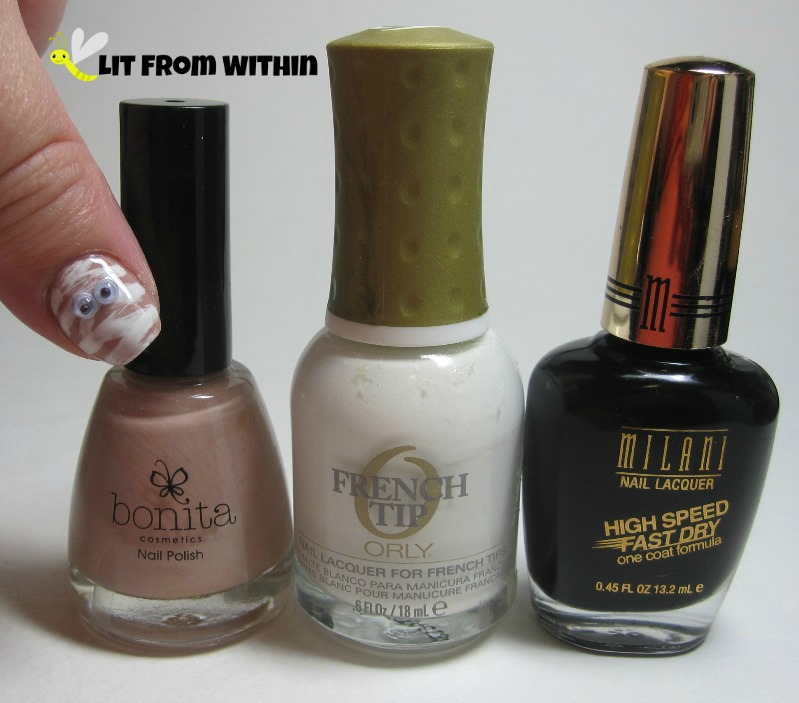 Bottle shot:  Bonita nude (unknown name), Orly Point Blanche, and Milani Black Swift