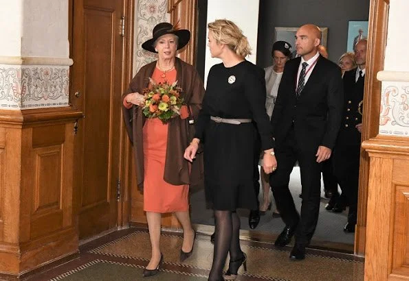 Princess Marie wore Paule Ka White Two Tone Belted Coat and Jimmy Choo pumps. Crown Princess Mary, Princess Benedikte abd Queen Margrethe