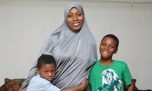 Felicia Perkins Ferreira with her children Ayyub and Mahmud at their home in Trinidad after their return from a Syrian refugee camp.
