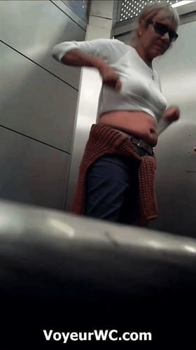 Women peeing in public toilet on hidden camera movie (Metal street toilet)