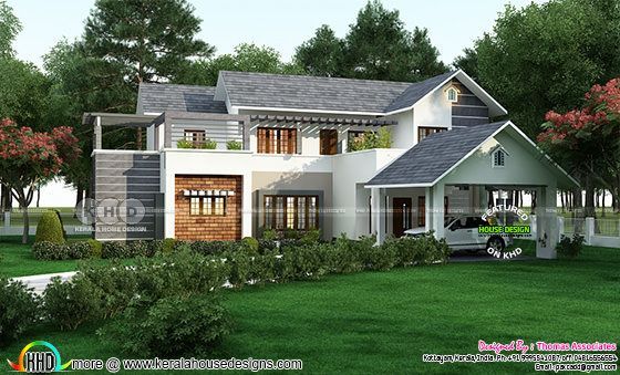 Sloping roof style house in Kerala with brick show wall