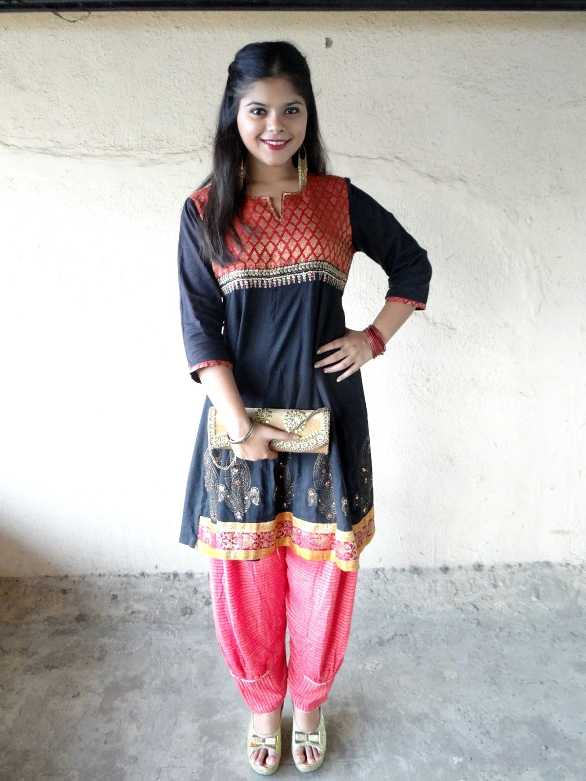 red black and gold outfit