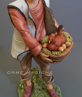 statuine artistiche statuetta nonno con cesta presepio milano orme magiche